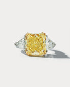 7.49 carat Fancy Yellow Radiant-cut Center Stone Three-stone Ring - Ammrada