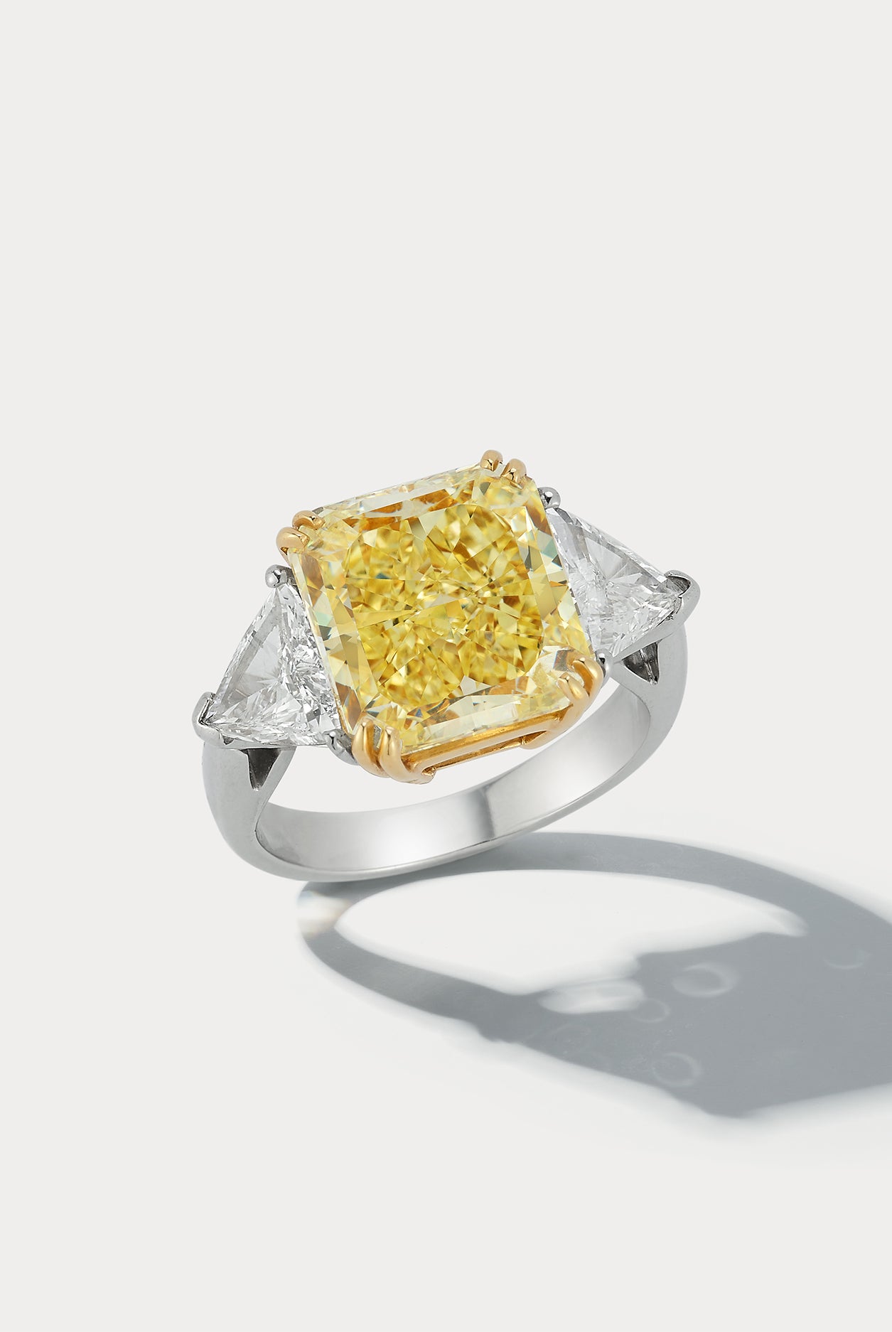 7.49 carat Fancy Yellow Radiant-cut Center Stone Three-stone Ring - Ammrada