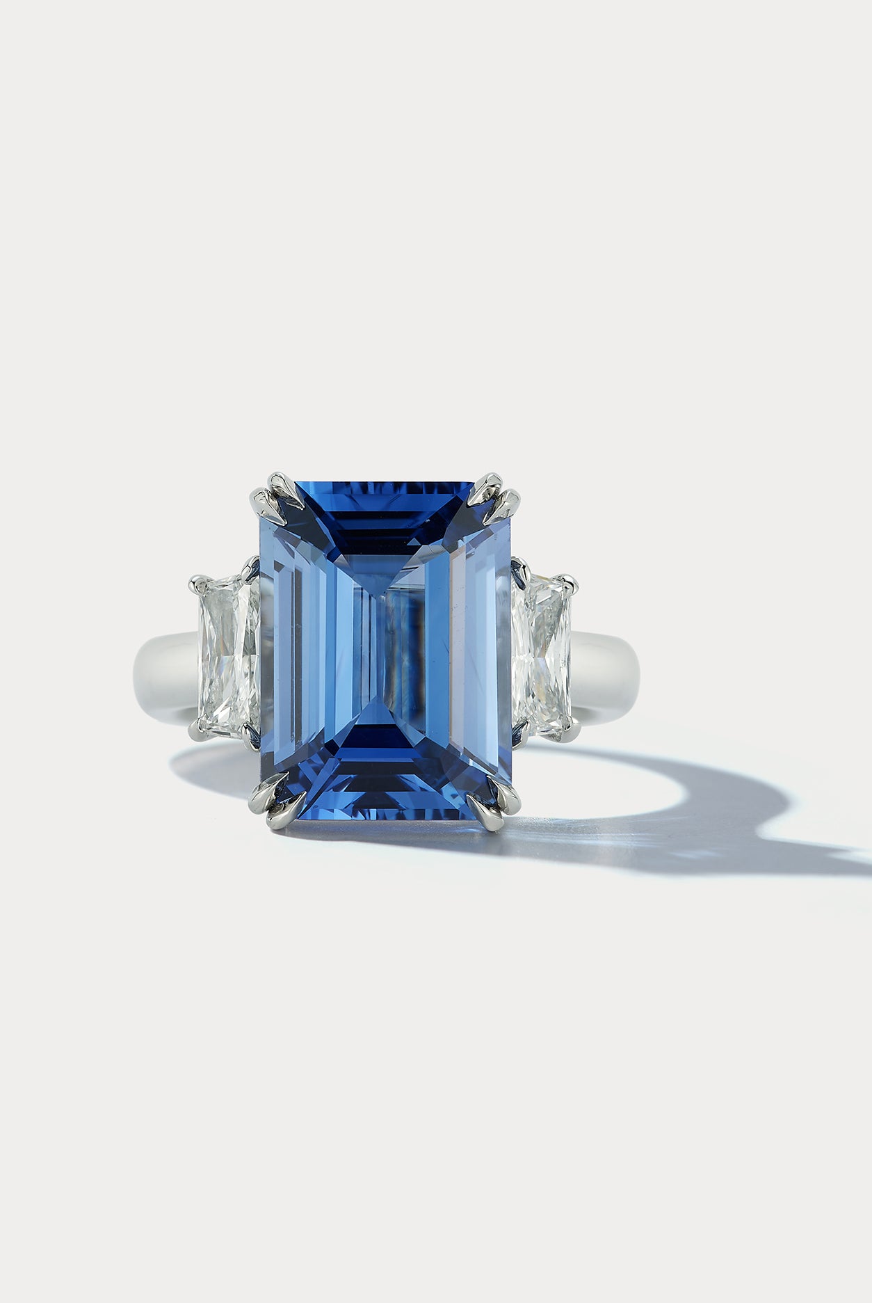 6.93 carat Emerald-cut Sapphire Center Stone Three Stone Ring - Ammrada
