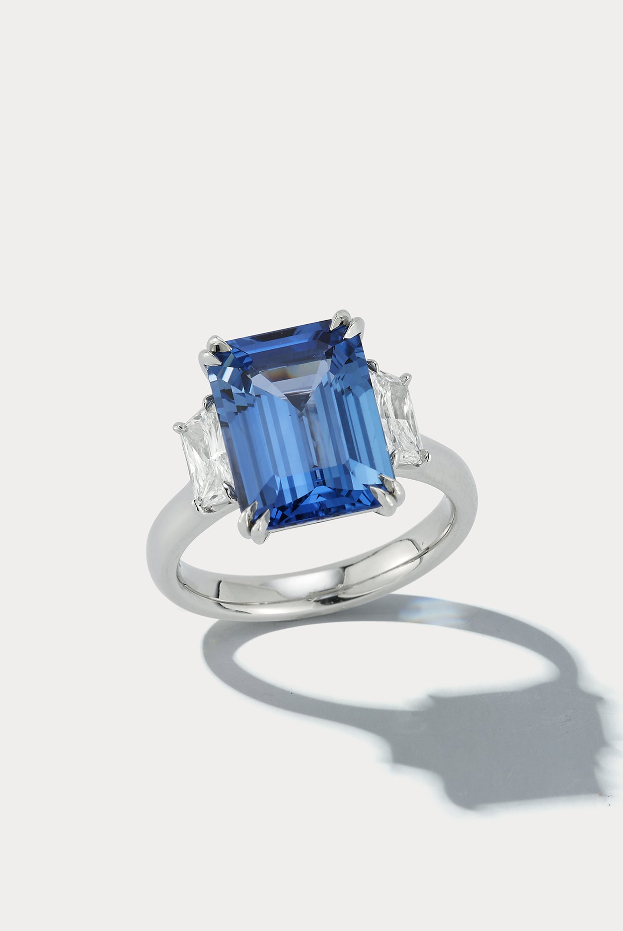 6.93 carat Emerald-cut Sapphire Center Stone Three Stone Ring - Ammrada