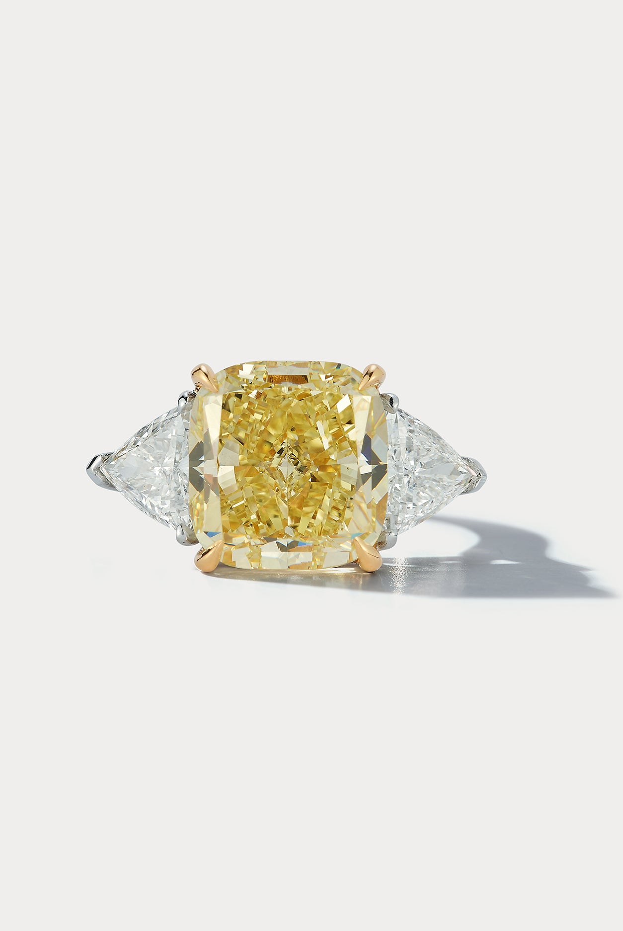 8.01 carat Fancy Yellow Cushion-cut Center stone Three-stone Ring - Ammrada