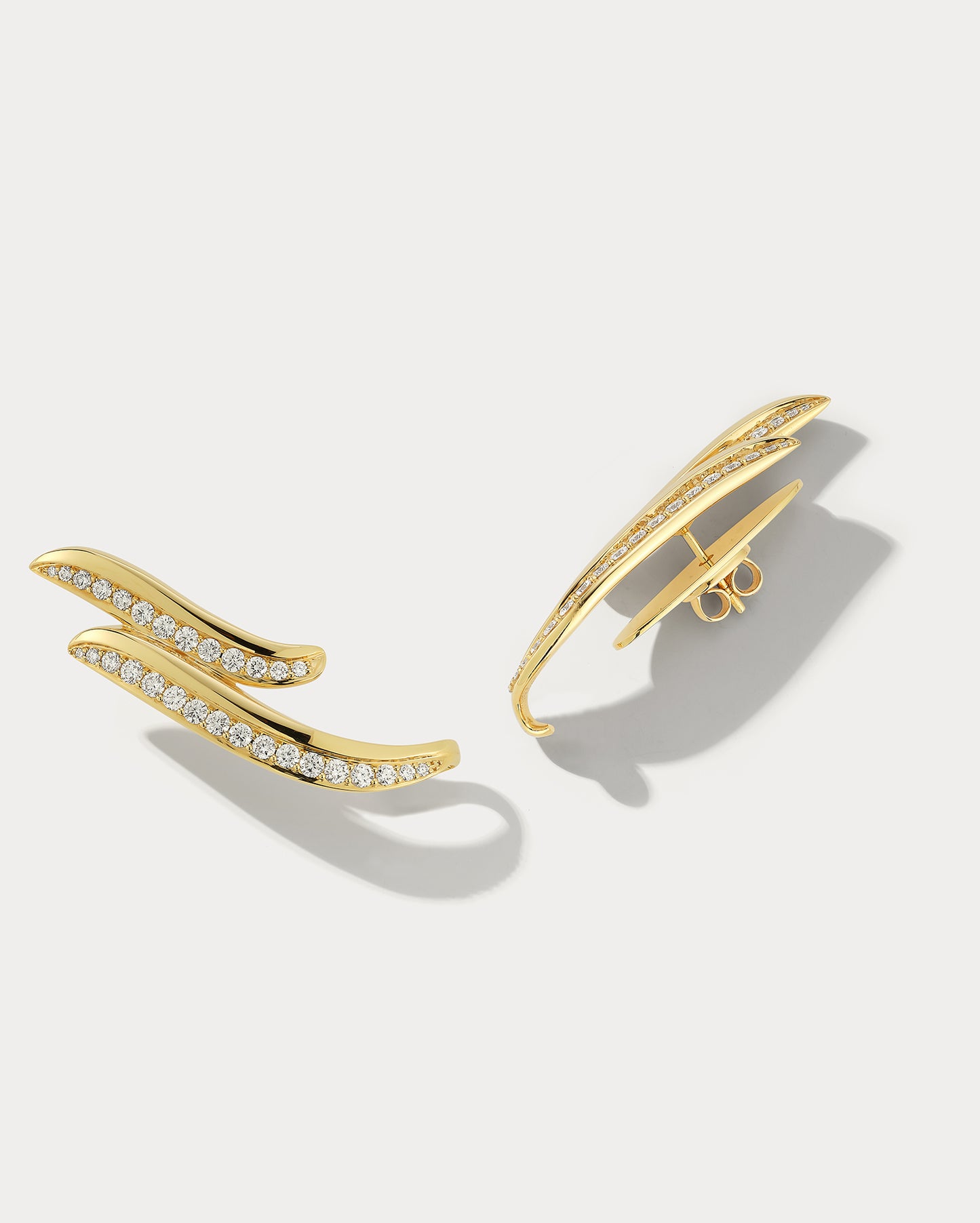 wave cross earring gold by ammrada