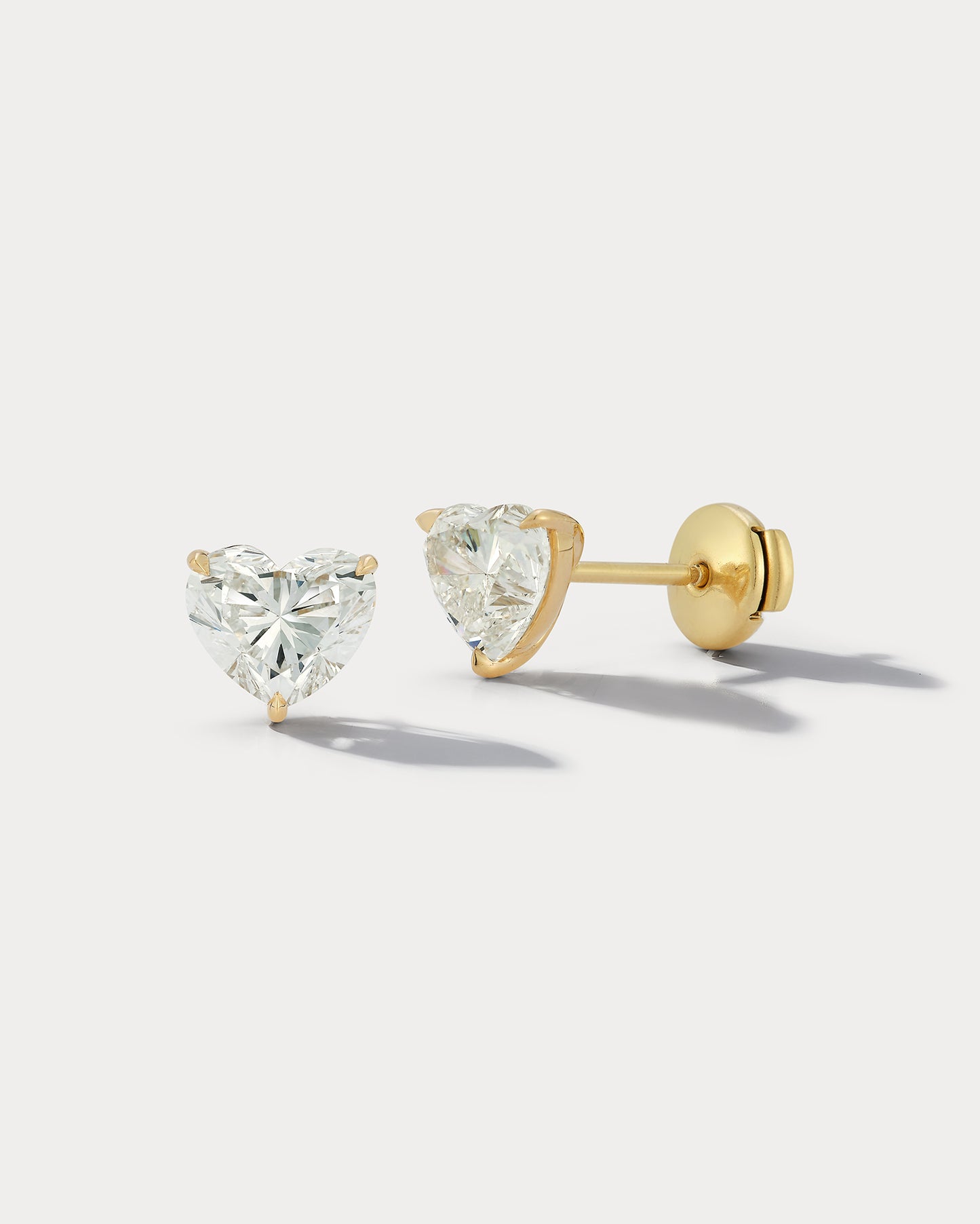 heart shape diamond studs by Ammrada
