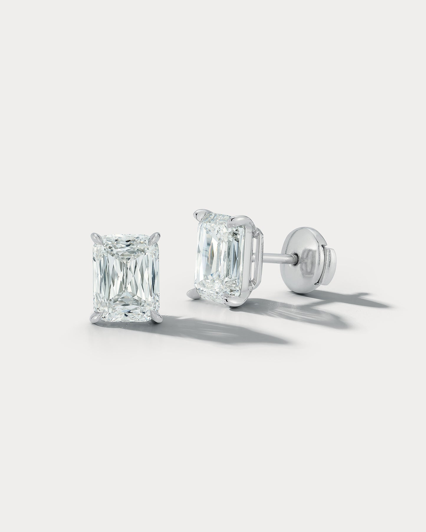diamond stud earrings | Ammrada