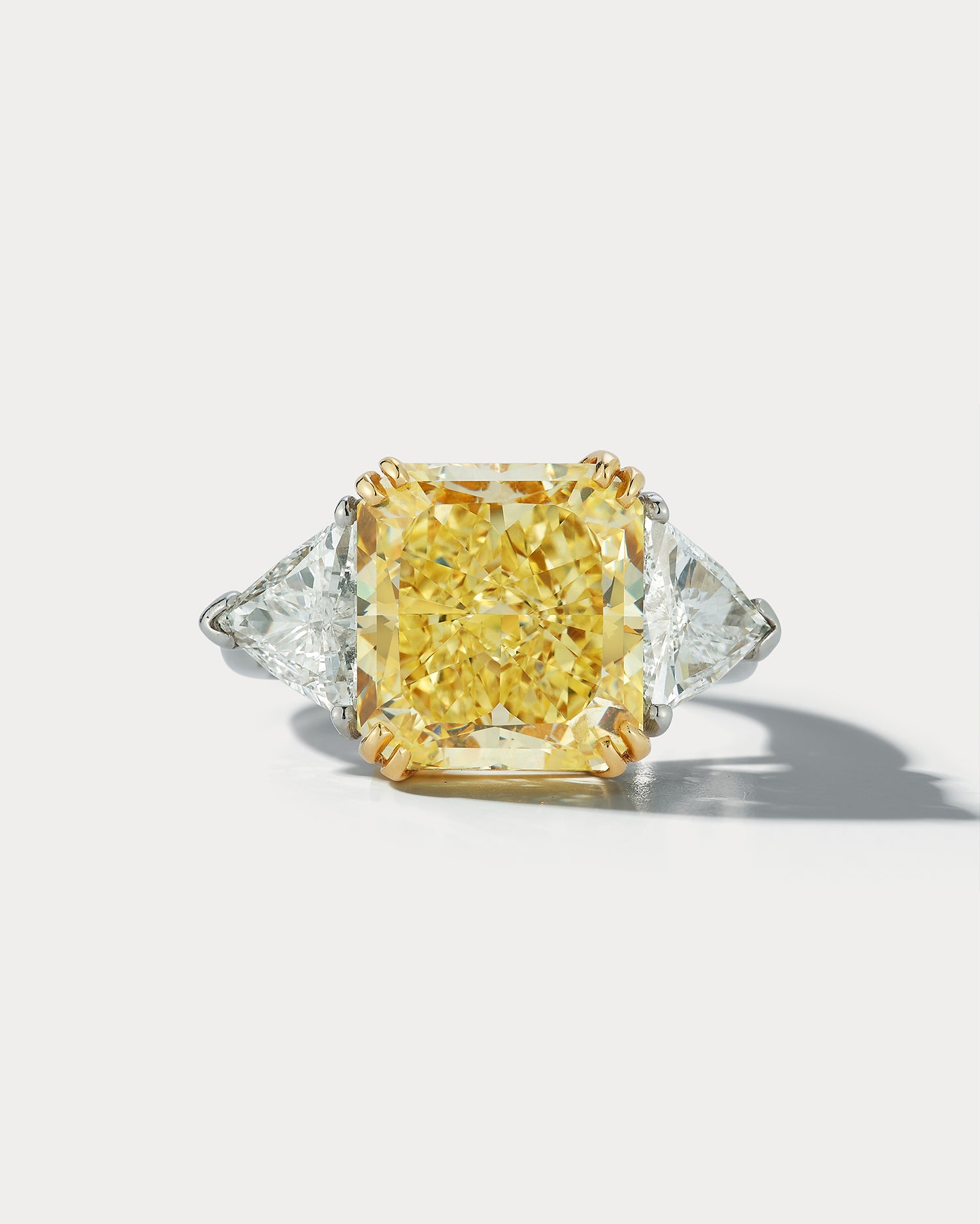 7.49 Fancy Yellow Radiant-cut Center Stone Three-stone diamond Ring - Ammrada
